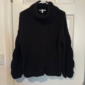 Black turtle neck sweater